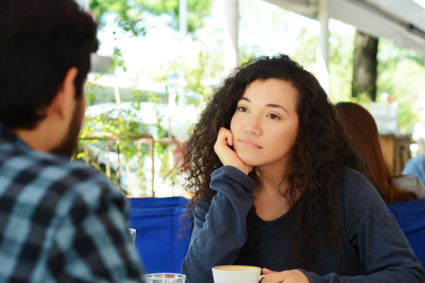 istock Young woman bored in a date. 1130325737