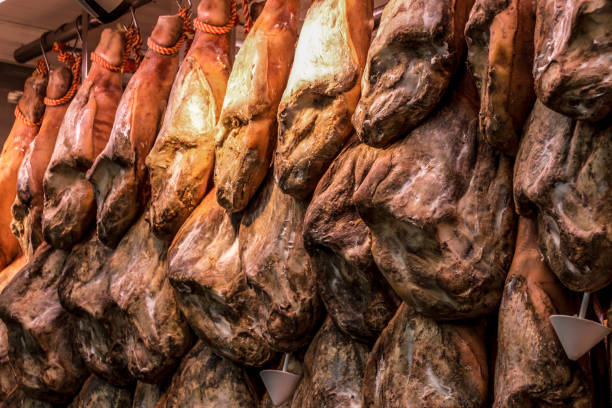 istock Counter with dried pork legs, Spanish Jamon. 1130327971
