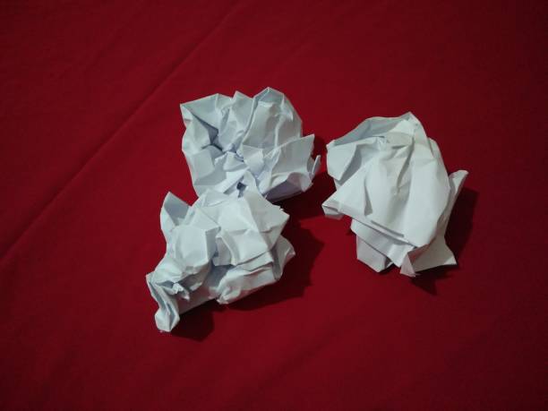 istock wrinkled papers. moody concept 1130328578