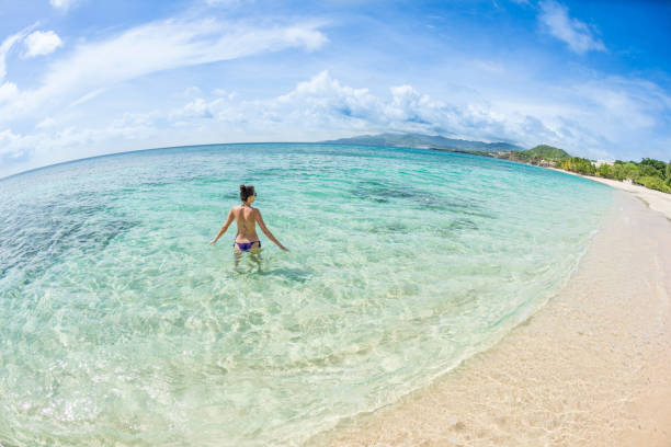 istock Drone view Woman Grenada Beach Caribbean 1130328585