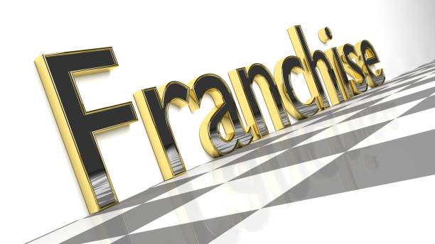 istock Franchise sign in golden glossy letters 1130329000