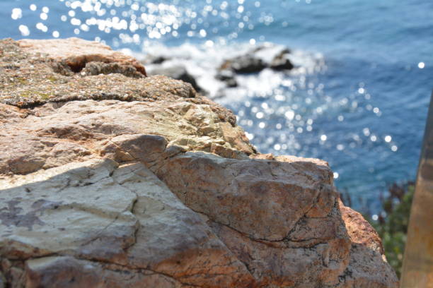 ECU - Rock on the coast of Lloret De Mar with the sea in the distance