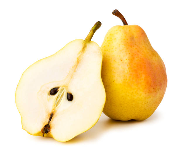 istock Ripe yellow pear and half on a white, isolated. 1130334832