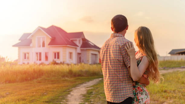 istock couple looking on house 1130338491