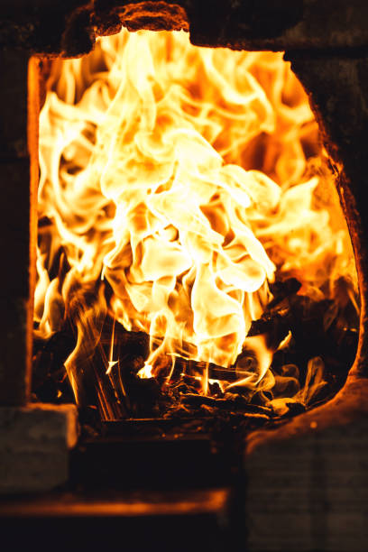 istock fire in blacksmith's furnace. 1130338649