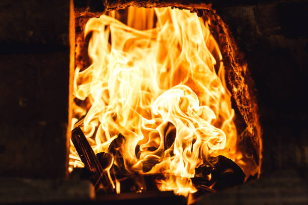 istock fire in blacksmith's furnace. 1130338654