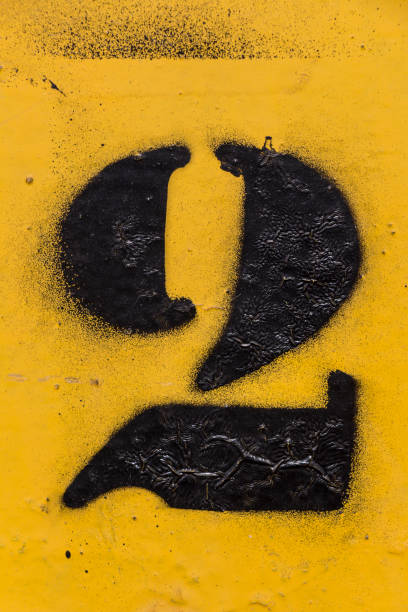 istock black number stencil painted on yellow background 1130341313