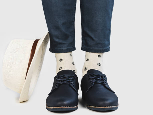 istock Office Manager, stylish shoes and bright socks 1130341917