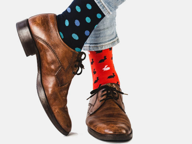 istock Office Manager in stylish shoes and bright socks 1130342030