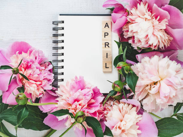 istock Beautiful greeting card with the word APRIL 1130342185