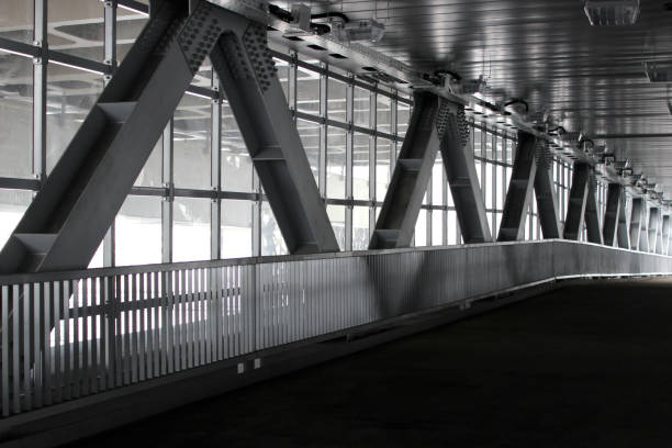 istock Metal construction, concrete floors, bridge. Supports are grey. Road. 1130343195