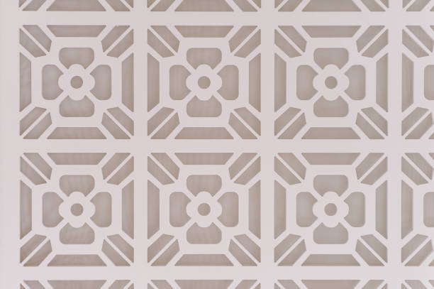 istock Decorative graphic background with flowers. Pattern of white flowers on a gray background. Abstract luxurious background beige. Texture paint pattern can used for wallpaper or wall tile. 1130344184