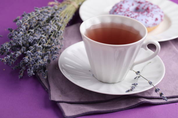 istock Lavender tea and lavender donut 1130344529
