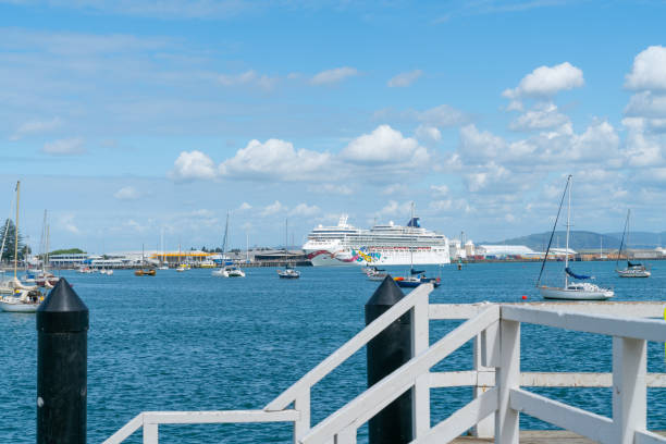 Cruise ship Norwegian Jewel berthed at Mount wharf across Pilot Bay during day while passengers go sightseeing February 2019 at Mount Maunganui, Tauranga New Zealand