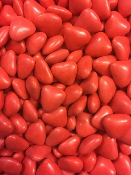 Red heart shaped sugared almonds