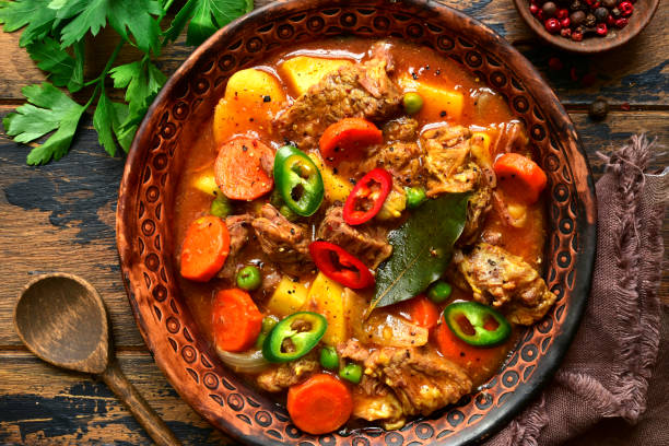 istock Meat stew with potato, carrot and green pea 1130350731