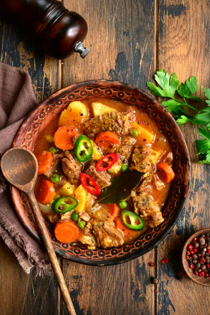 istock Meat stew with potato, carrot and green pea 1130350802
