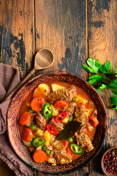 istock Meat stew with potato, carrot and green pea 1130350923