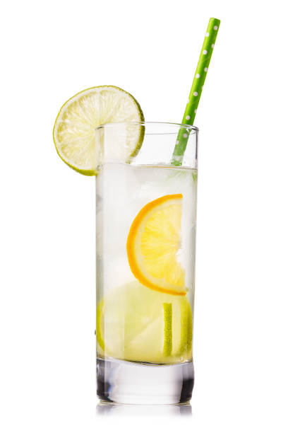 istock Tonic: water with lemon and lime in a clear glass, isolated on white background 1130351074