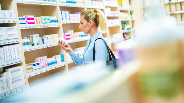 istock Woman shopping at pharmacy 1130351114