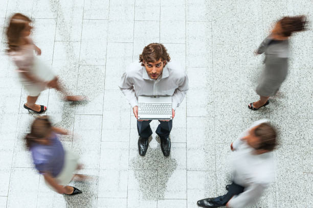 istock Young businessman with laptop 1130351136