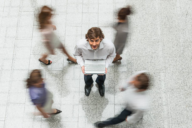 istock Young businessman with laptop 1130351160