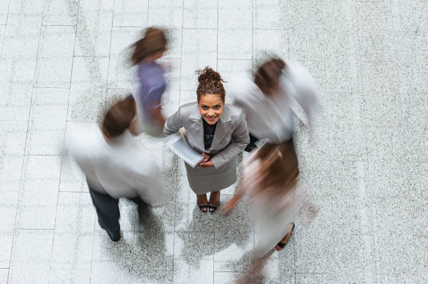 istock Young businesswoman with files 1130351184