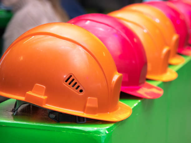 istock Colored helmets on a green table in the entertainment center. 1130351417