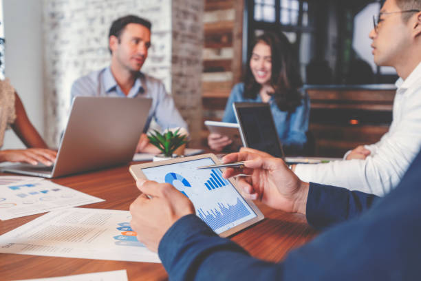 istock Group of people meeting with technology. 1130352086