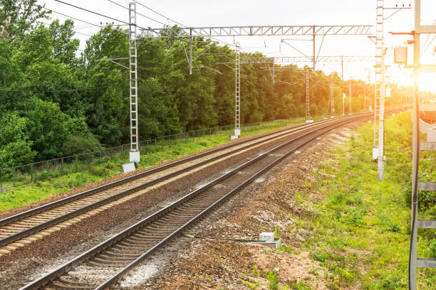 istock Electrified empty railway with two ways. View of the turn 1130352346