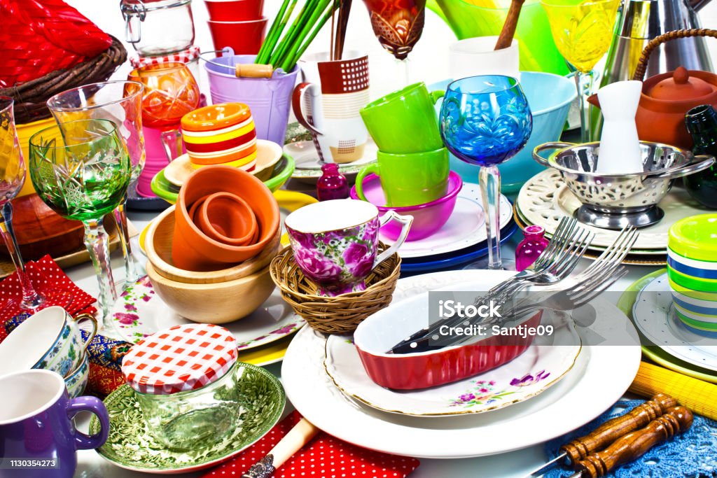 A lot of household wares on a table A lot of household wares on a table close up Flea Market Stock Photo