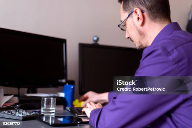 Man At Work In Office Stock Photo - Download Image Now - 35-39 Years, Adult, Adults Only
