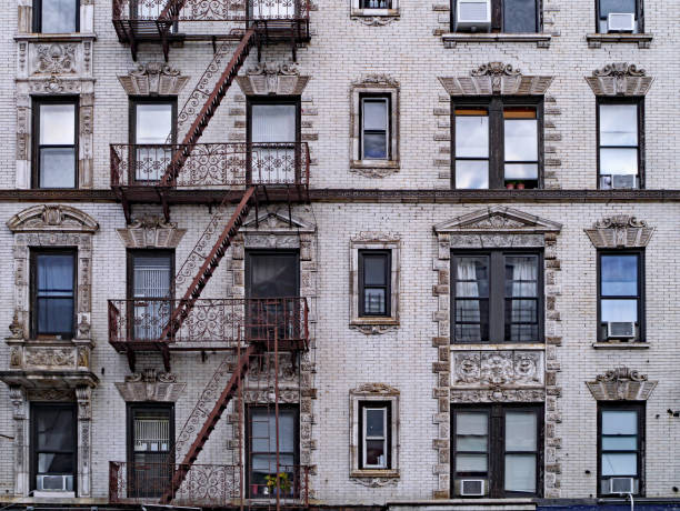 istock old New York apartment building with external fire escapes 1130362304