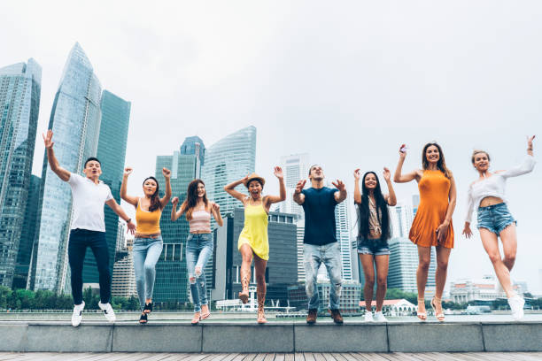 istock Happy friends are jumping 1130362517