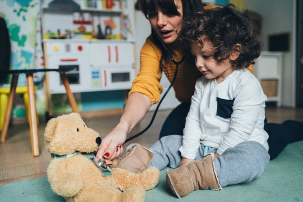 istock Mother and son playing doctor 1130362525