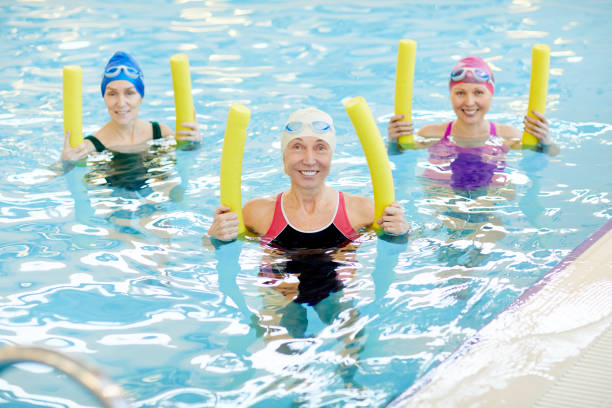 istock Group of Women doing Water Aerobics 1130365640