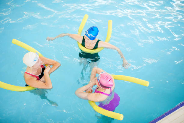 Three Women Relaxing in Water
