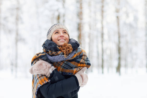 istock Happy Young Woman Enjoying Winter 1130366564