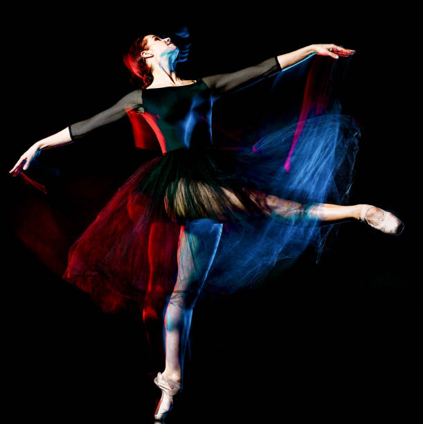 istock ballerina classical ballet dancer dancing woman isolated black b 1130368793