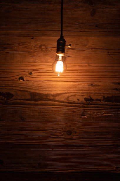 istock light bulb against a wooden background 1130370591