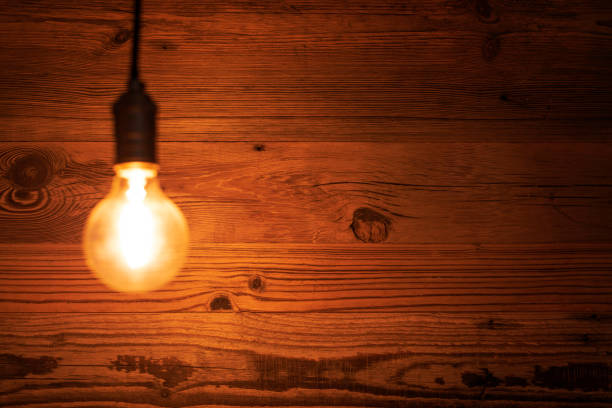 istock light bulb against a wooden background 1130370597