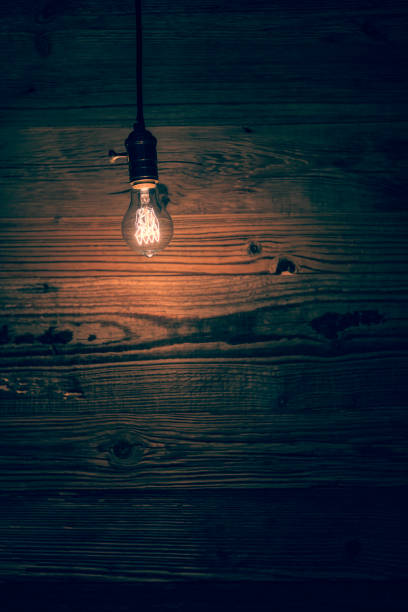 istock light bulb against a wooden background (HDRi) 1130370601