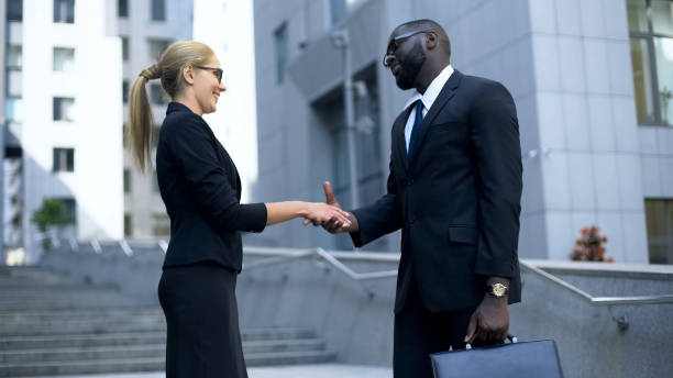 istock Business people shaking hands, collaboration and partnership, getting acquainted 1130374170