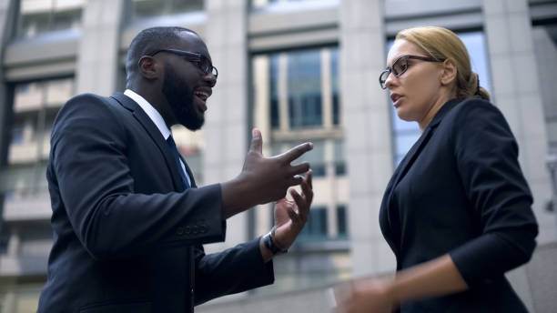 istock Office workers having conflict, disrespecting business partner, bad day, stress 1130375190