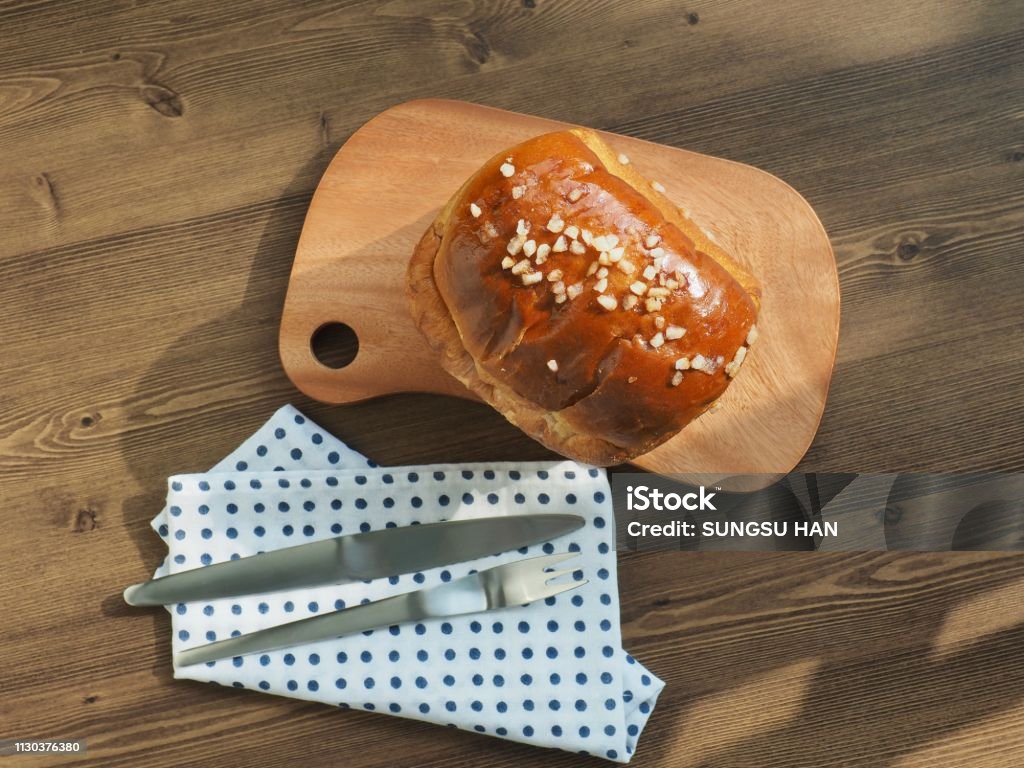 Blueberry bread on wooden board Shot in studio 7-Grain Bread Stock Photo
