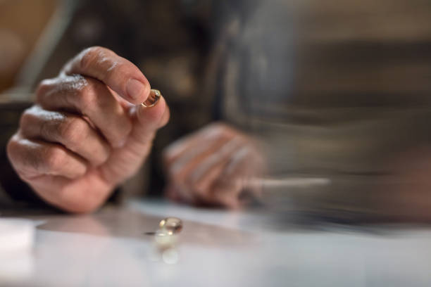 istock Close up of soldier taking omega 3 capsule. 1130376466