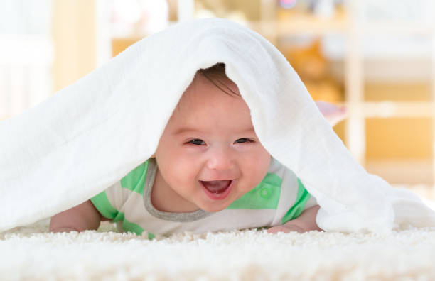 istock Happy baby boy lying down 1130377505