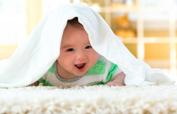 istock Happy baby boy lying down 1130377511
