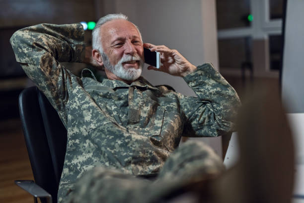 istock Relaxed senior military officer communicating on mobile phone. 1130378093