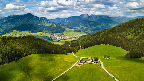 istock Spring travel in Austria. Green fields and meadows 1130381278